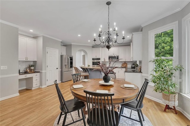 809 Hillcrest Ln, Woodstock, GA 30189 - dining room featuring recessed lighting, light wood-style floors, a chandelier, ornamental molding, and baseboards