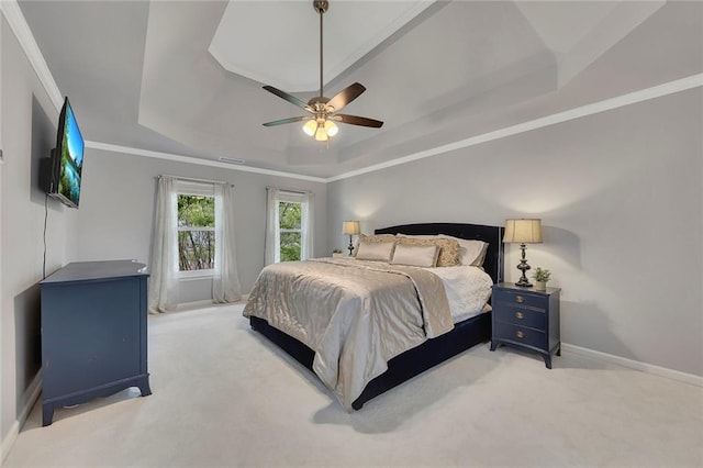 809 Hillcrest Ln, Woodstock, GA 30189 - bedroom with a raised ceiling, light colored carpet, baseboards, a ceiling fan, and crown molding
