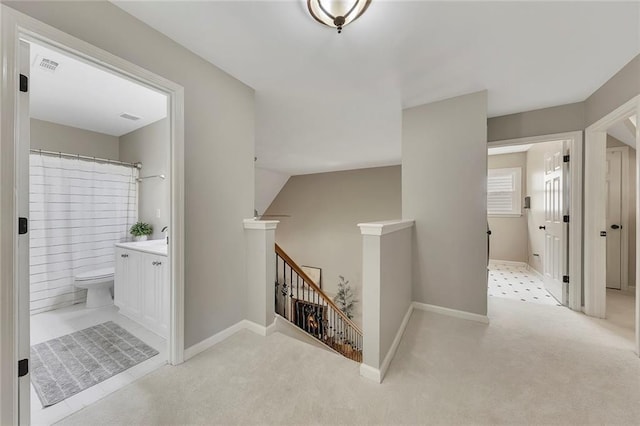 809 Hillcrest Ln, Woodstock, GA 30189 - hall with an upstairs landing, light carpet, and baseboards