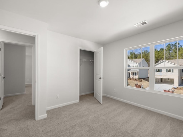 13 Coggins Pl, Rome, GA 30165 - unfurnished bedroom featuring light carpet, baseboards, and a closet