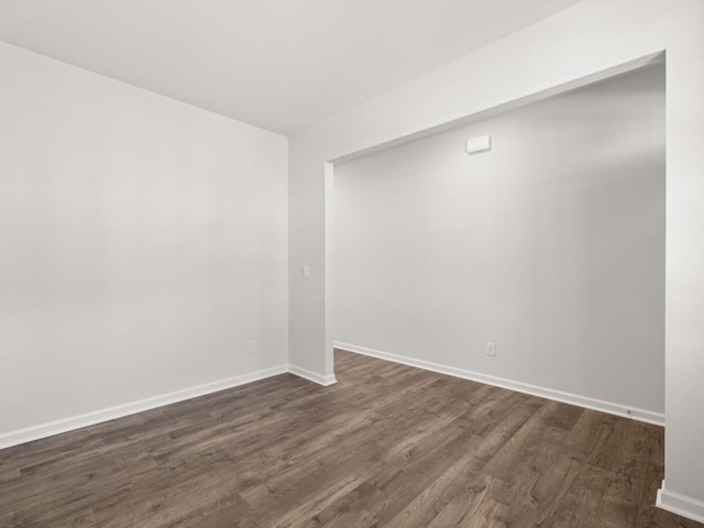 13 Coggins Pl, Rome, GA 30165 - empty room featuring dark wood-style floors and baseboards