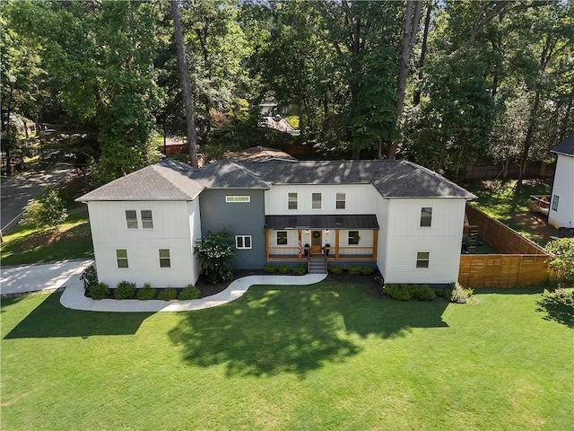3899 Carlton Dr, Chamblee, GA 30341 - modern farmhouse style home featuring covered porch and a shingled roof