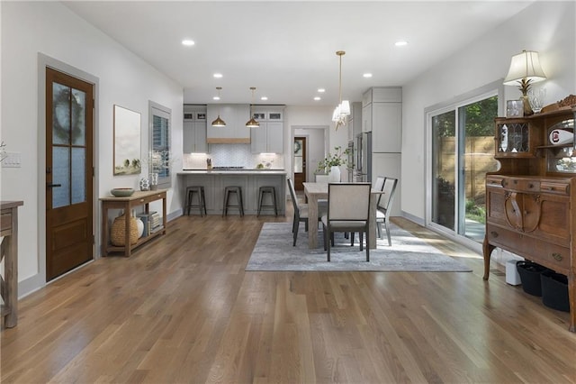 3899 Carlton Dr, Chamblee, GA 30341 - dining space with wood finished floors and recessed lighting