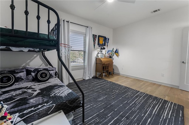 3899 Carlton Dr, Chamblee, GA 30341 - bedroom featuring wood finished floors and a ceiling fan