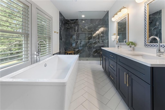 3899 Carlton Dr, Chamblee, GA 30341 - full bathroom featuring a freestanding bath, double vanity, a marble finish shower, tile patterned floors, and recessed lighting