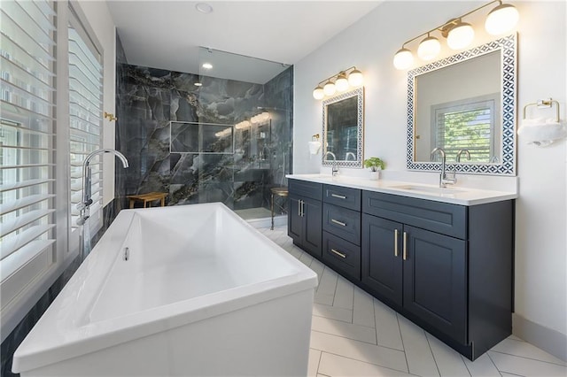 3899 Carlton Dr, Chamblee, GA 30341 - bathroom featuring a freestanding bath, double vanity, a marble finish shower, tile patterned floors, and recessed lighting