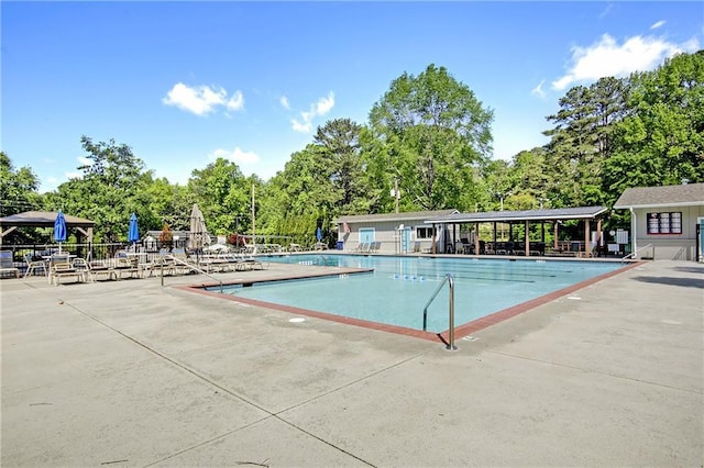 3899 Carlton Dr, Chamblee, GA 30341 - community pool with a patio and view of scattered trees
