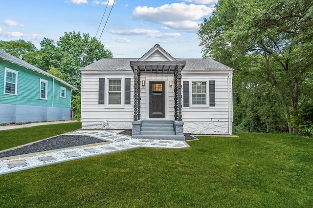 view of front of home with a front yard