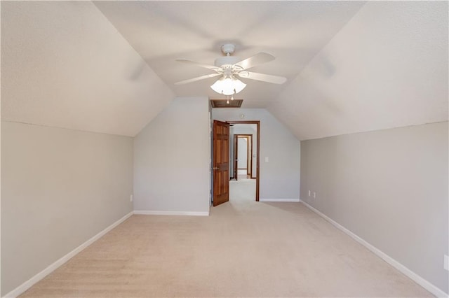 bonus room with lofted ceiling and ceiling fan