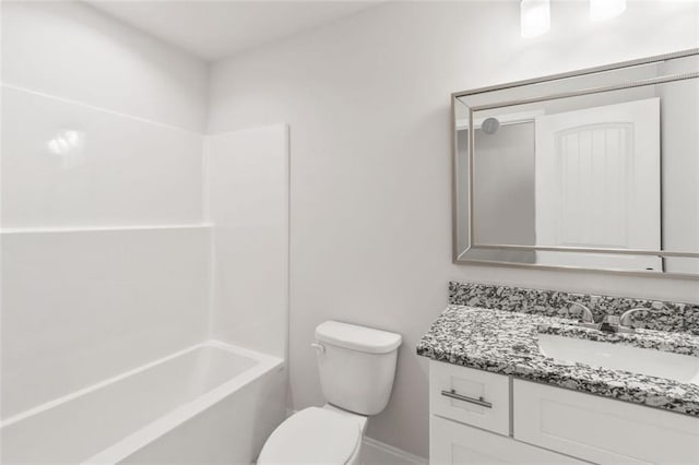 5209 Waterworks Rd, Jefferson, GA 30549 - full bath featuring vanity, toilet, baseboards, and tub / shower combination