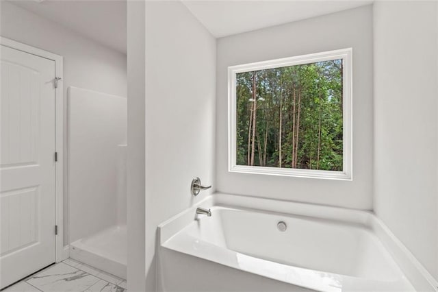 5209 Waterworks Rd, Jefferson, GA 30549 - full bathroom with a garden tub and marble finish flooring