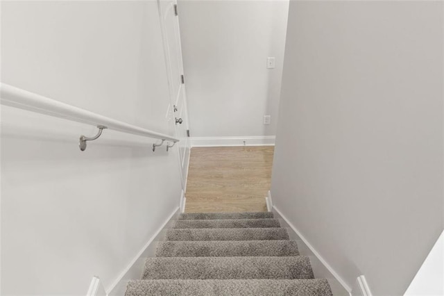 5209 Waterworks Rd, Jefferson, GA 30549 - staircase with baseboards and wood finished floors