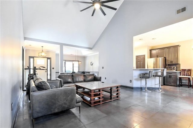 living area featuring a toaster, visible vents, baseboards, ceiling fan, and high vaulted ceiling