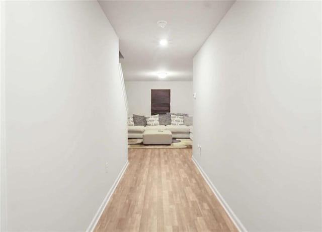 20 Sloane Ct, Covington, GA 30016 - corridor featuring light wood-type flooring and baseboards