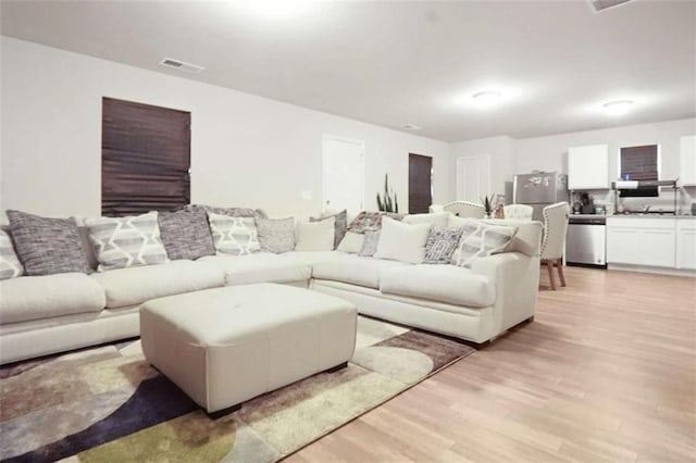 20 Sloane Ct, Covington, GA 30016 - living room with light wood-style floors