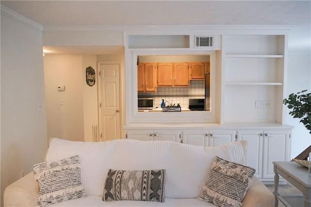 living room featuring ornamental molding