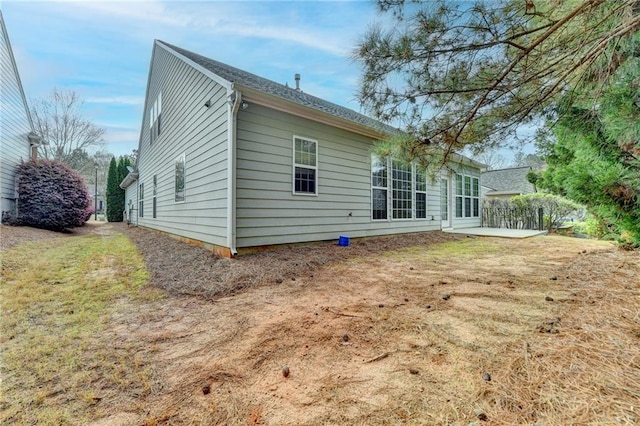 rear view of property with a patio area