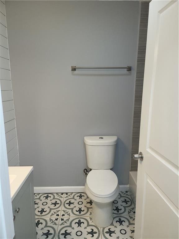 4664 Ryan Rd, Conley, GA 30288 - bathroom with baseboards, vanity, toilet, and tile patterned floors