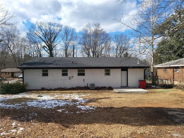 4664 Ryan Rd, Conley, GA 30288 - rear view of property featuring brick siding, cooling unit, and roof with shingles