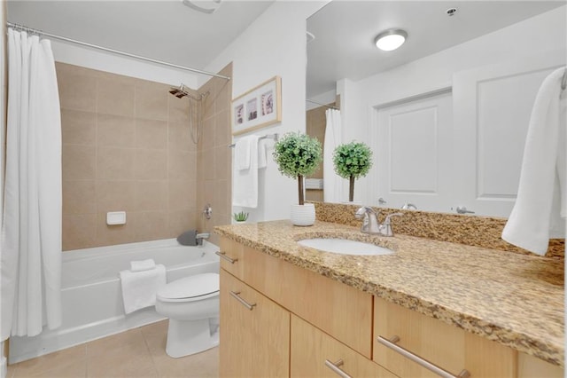 full bathroom featuring shower / bath combination with curtain, vanity, toilet, and tile patterned floors