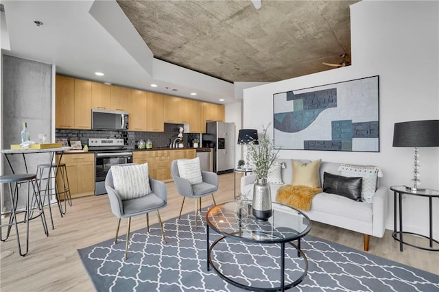 living area featuring light wood finished floors