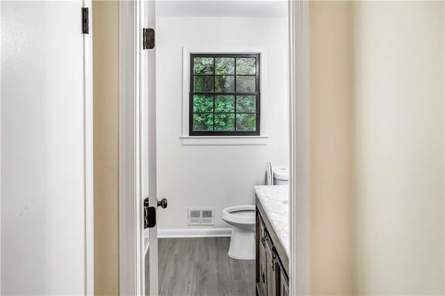 3530 Turner Heights Dr, Decatur, GA 30032 - bathroom with vanity and wood finished floors
