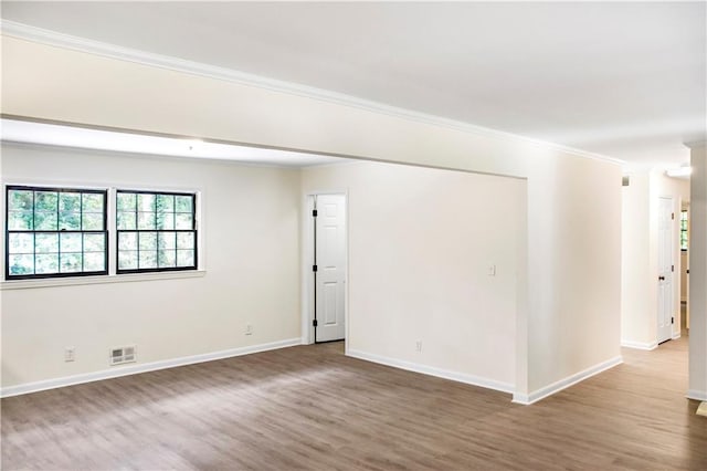 3530 Turner Heights Dr, Decatur, GA 30032 - empty room featuring wood finished floors and ornamental molding