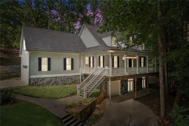 view of front of home featuring a garage and covered porch