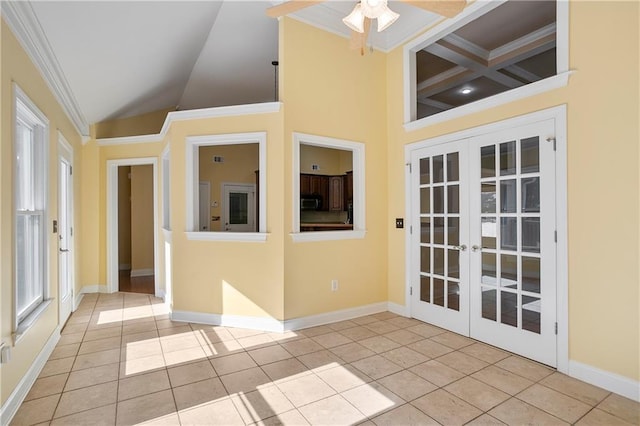 spare room featuring crown molding and french doors