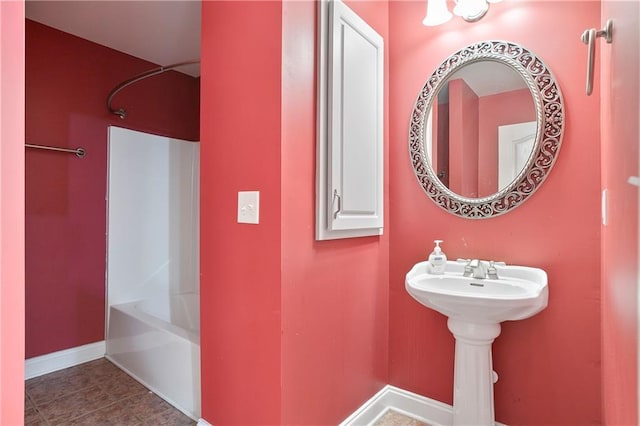 bathroom featuring shower / tub combination and tile patterned floors