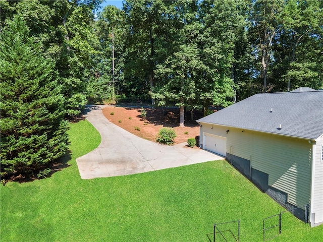view of yard with a garage