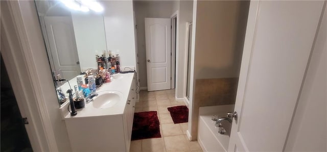 5719 Singlebriar Ct, Norcross, GA 30093 - full bath with tile patterned floors, double vanity, a bath, and an enclosed shower