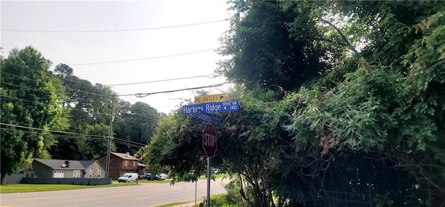 5719 Singlebriar Ct, Norcross, GA 30093 - view of asphalt street featuring traffic signs