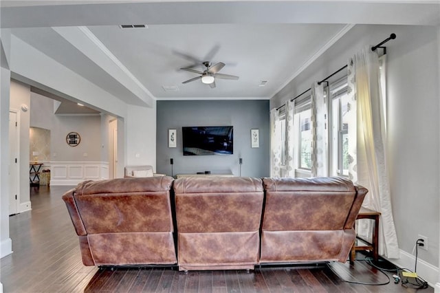 7470 Oldbury Pl, Cumming, GA 30040 - living area featuring ceiling fan, dark wood-style flooring, ornamental molding, and a decorative wall