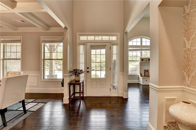 7470 Oldbury Pl, Cumming, GA 30040 - foyer with plenty of natural light, hardwood / wood-style flooring, wainscoting, beamed ceiling, and coffered ceiling