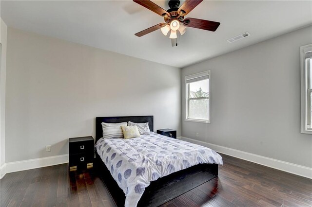 7470 Oldbury Pl, Cumming, GA 30040 - bedroom with baseboards, hardwood / wood-style flooring, and a ceiling fan