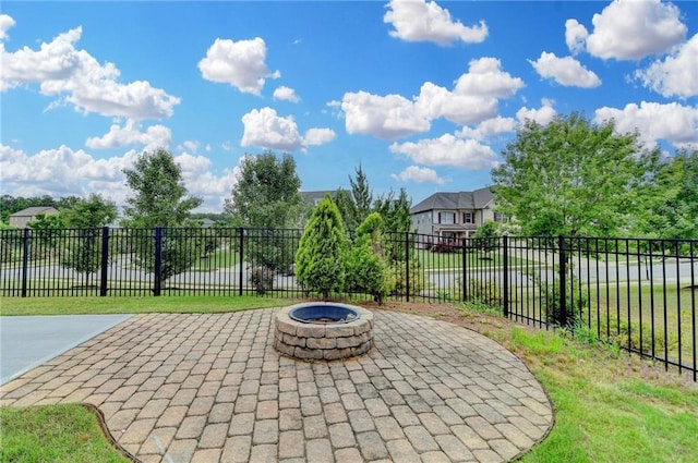 7470 Oldbury Pl, Cumming, GA 30040 - view of patio with an outdoor fire pit