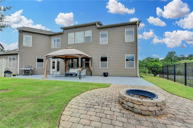 7470 Oldbury Pl, Cumming, GA 30040 - back of house with a fire pit, a patio area, and a gazebo