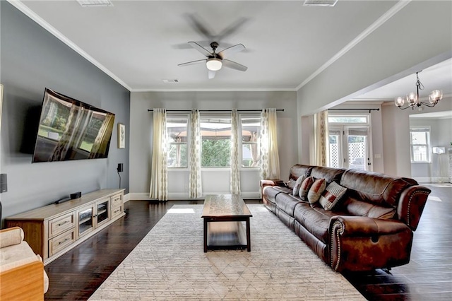 7470 Oldbury Pl, Cumming, GA 30040 - living area featuring a ceiling fan, ornamental molding, wood finished floors, a chandelier, and baseboards