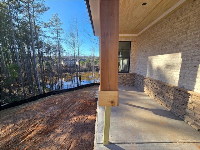 view of patio / terrace featuring a water view