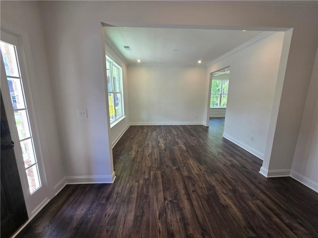 3677 Thornhill Ct, Douglasville, GA 30135 - spare room featuring crown molding, baseboards, and dark wood-type flooring