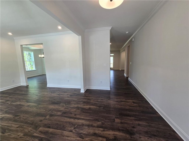 3677 Thornhill Ct, Douglasville, GA 30135 - spare room featuring ornamental molding, dark wood-type flooring, baseboards, a chandelier, and recessed lighting