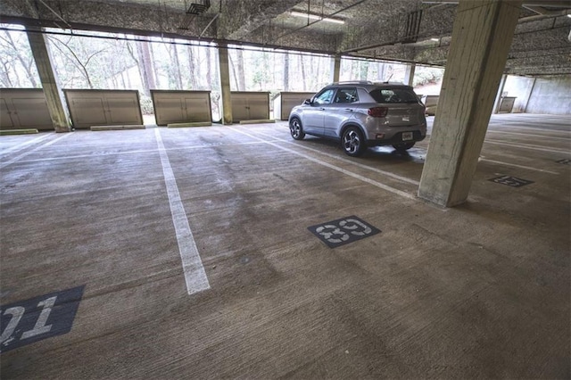 garage featuring a carport