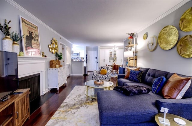 living room with crown molding and dark wood-type flooring