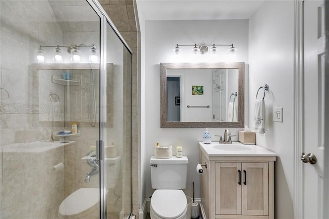 705 Berry Ct, Villa Rica, GA 30180 - bathroom featuring toilet, vanity, and a stall shower