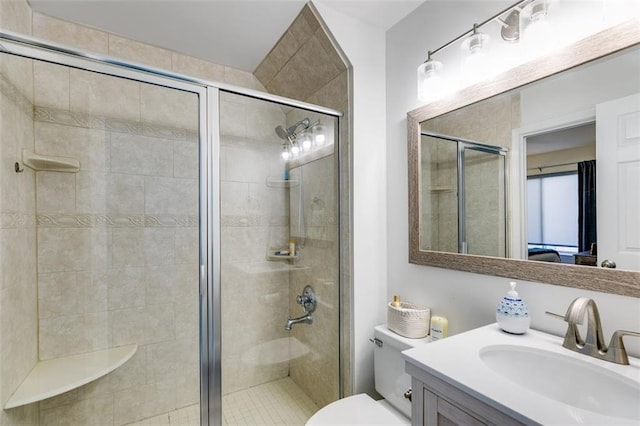 705 Berry Ct, Villa Rica, GA 30180 - bathroom featuring toilet, a shower stall, and vanity
