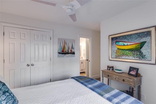 705 Berry Ct, Villa Rica, GA 30180 - bedroom with a closet, ensuite bath, a ceiling fan, and baseboards