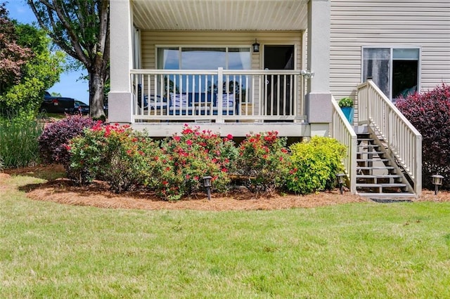 705 Berry Ct, Villa Rica, GA 30180 - doorway to property featuring a lawn and a porch