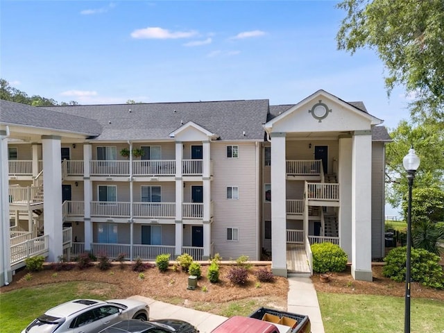 705 Berry Ct, Villa Rica, GA 30180 - view of building exterior featuring uncovered parking