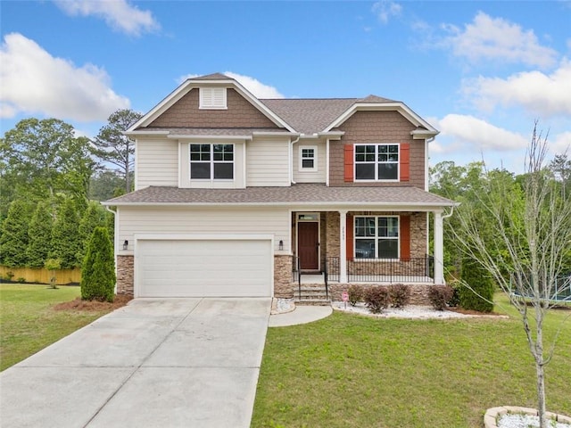 craftsman house with a porch, concrete driveway, an attached garage, a front lawn, and a shingled roof